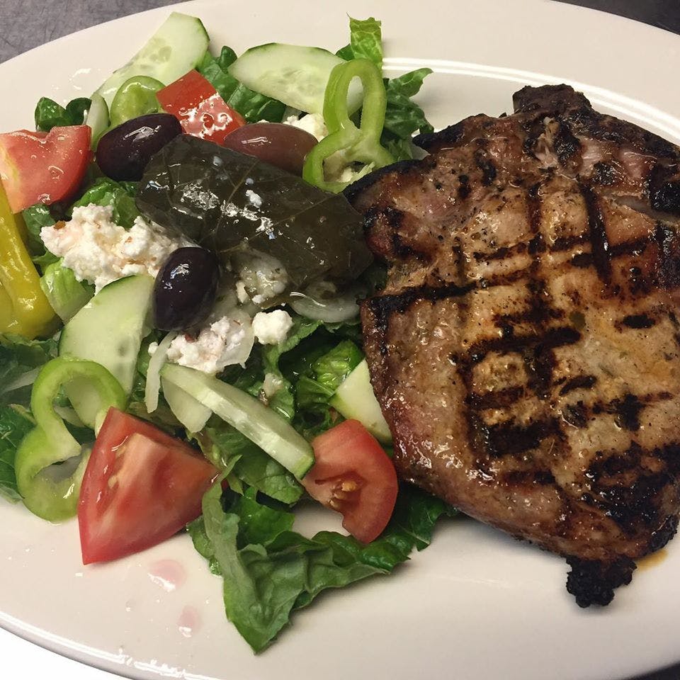 Order Grilled Pork Chops with Greek Salad Lunch - Lunch food online from Mykonos Restaurant store, North Arlington on bringmethat.com
