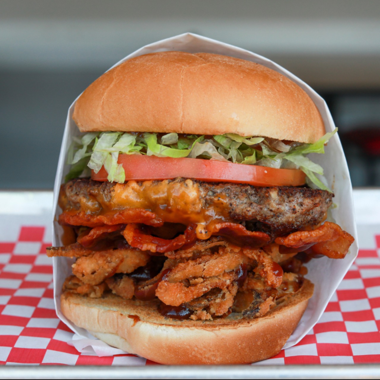 Order The BBQ Burger food online from Biggie Burgers store, San Diego on bringmethat.com