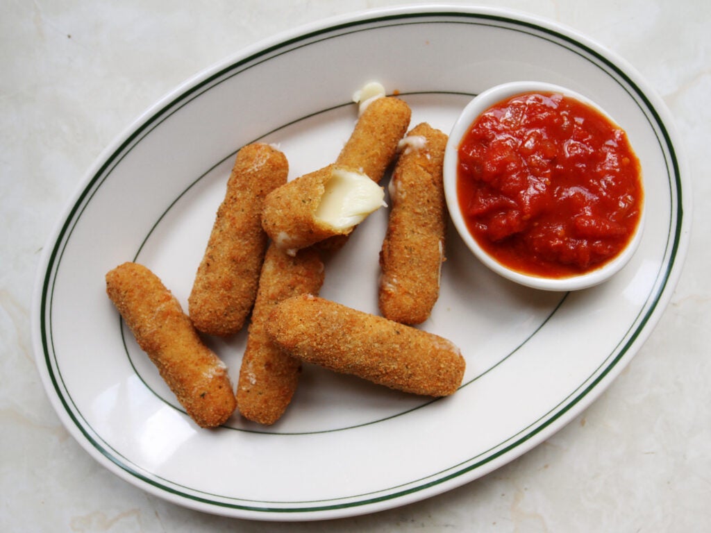 Order Mozzarella Sticks food online from Juicy Cheesesteaks store, Schenectady on bringmethat.com