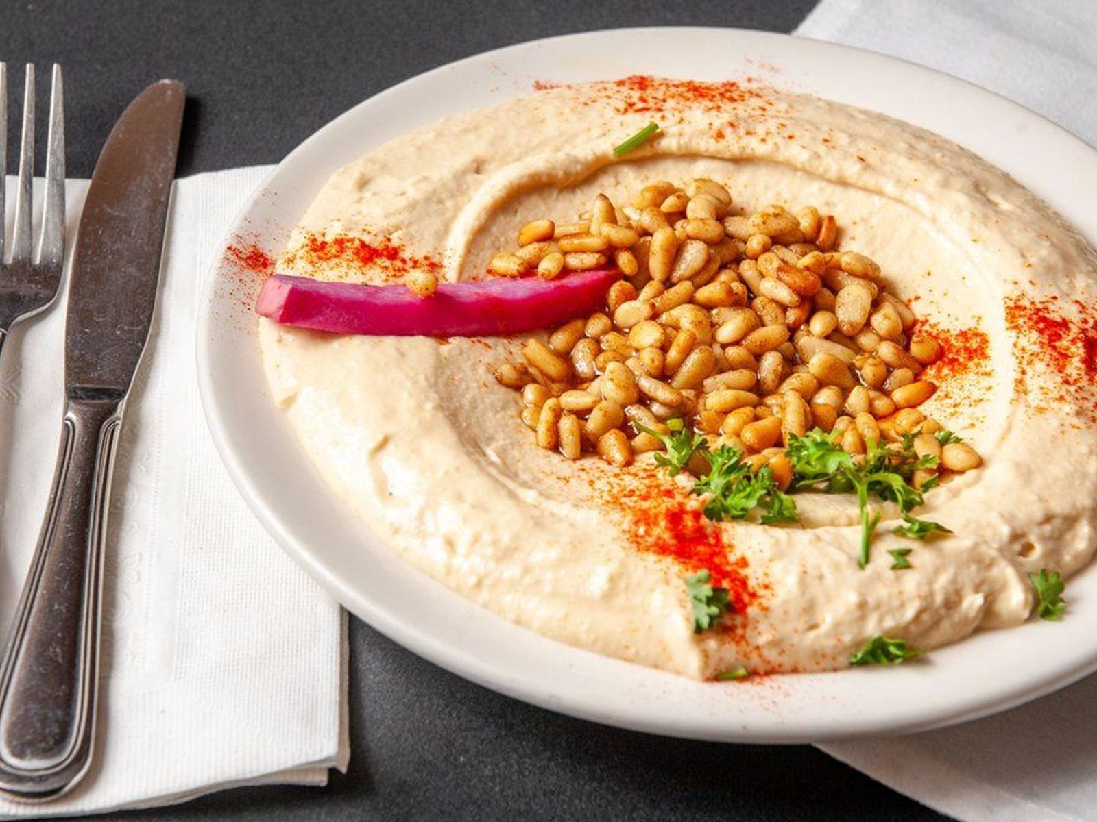 Order Hummus with Pine Nuts food online from Lebanese Grill  store, Rochester on bringmethat.com