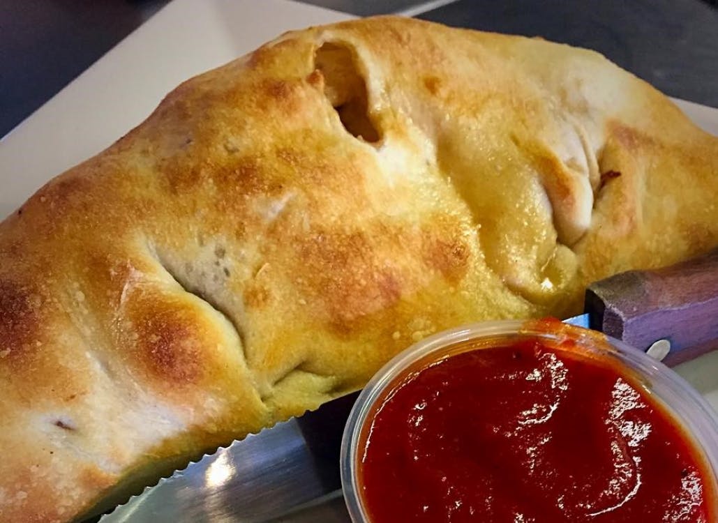 Order Cheese Calzone - Small food online from Basil Pizza store, Dublin on bringmethat.com