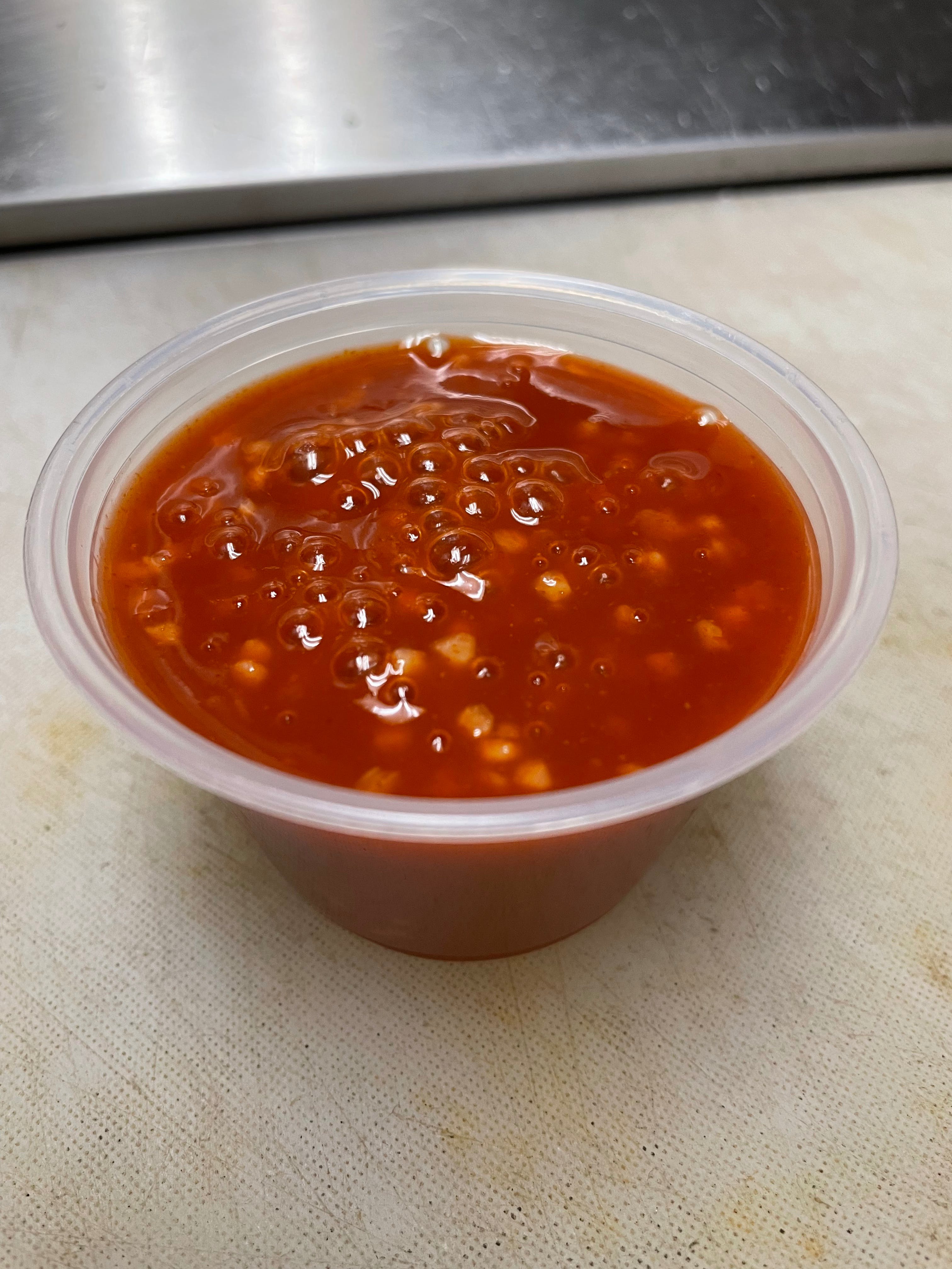 Order Spicy Garlic Sauce - 2 oz. food online from Brooklyn Pizza & Pasta store, Cincinnati on bringmethat.com