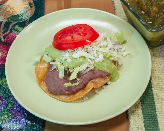 Order Tostada With Beans food online from El Indio Mexicano Restaurant store, Los Angeles on bringmethat.com