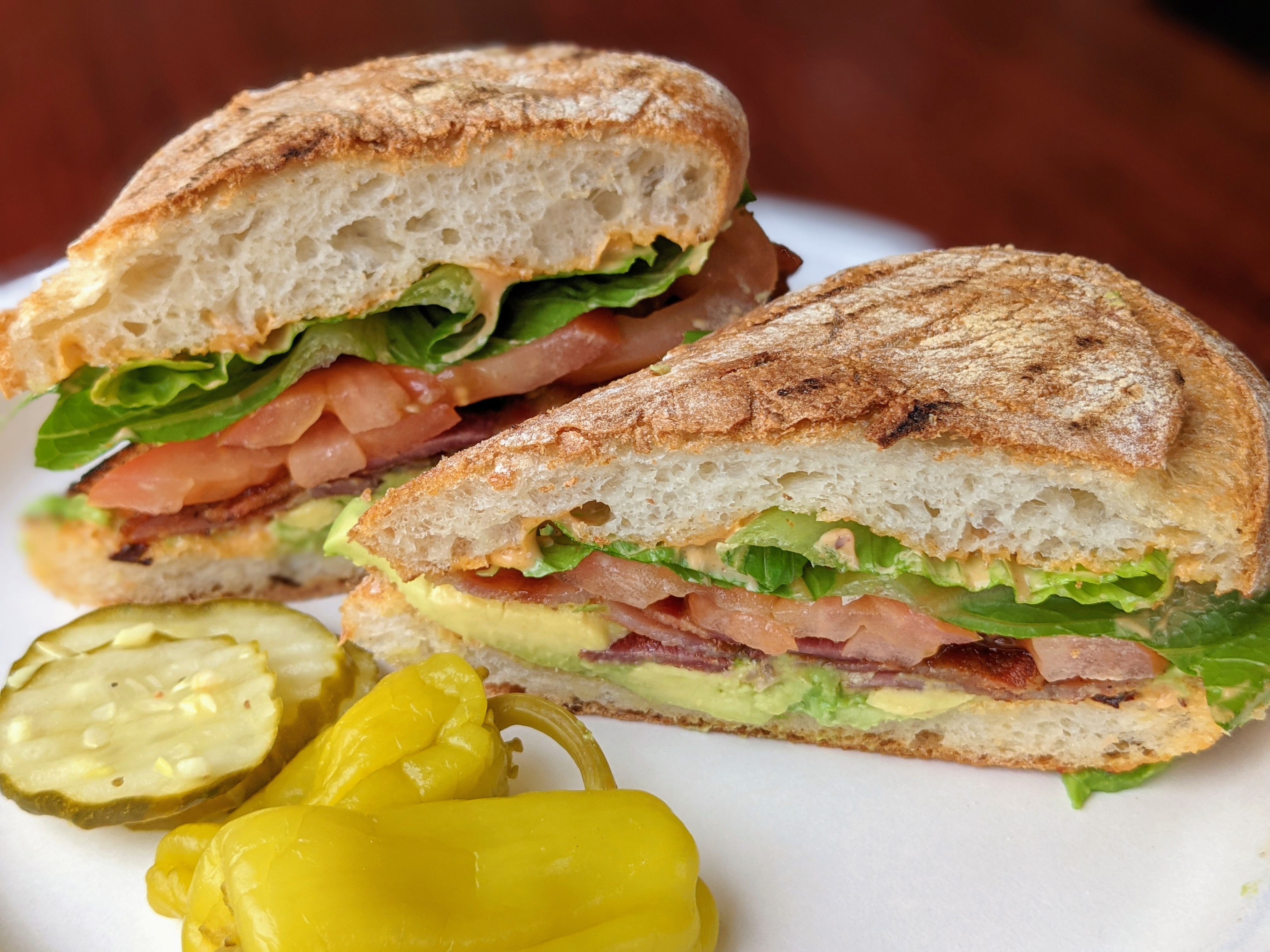 Order BLTA Panini food online from Caffe Chiave store, Oakland on bringmethat.com
