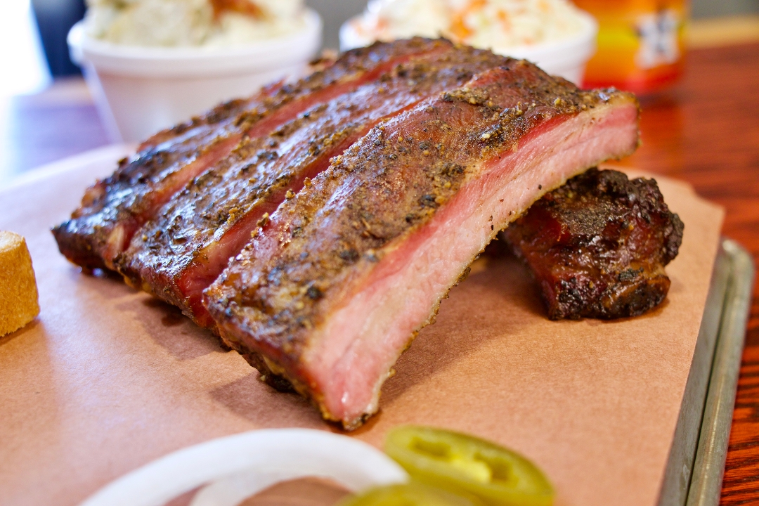 Order Half Rack of Pork Ribs food online from 2 Guys 1 Pit Bbq & Catering store, Tomball on bringmethat.com