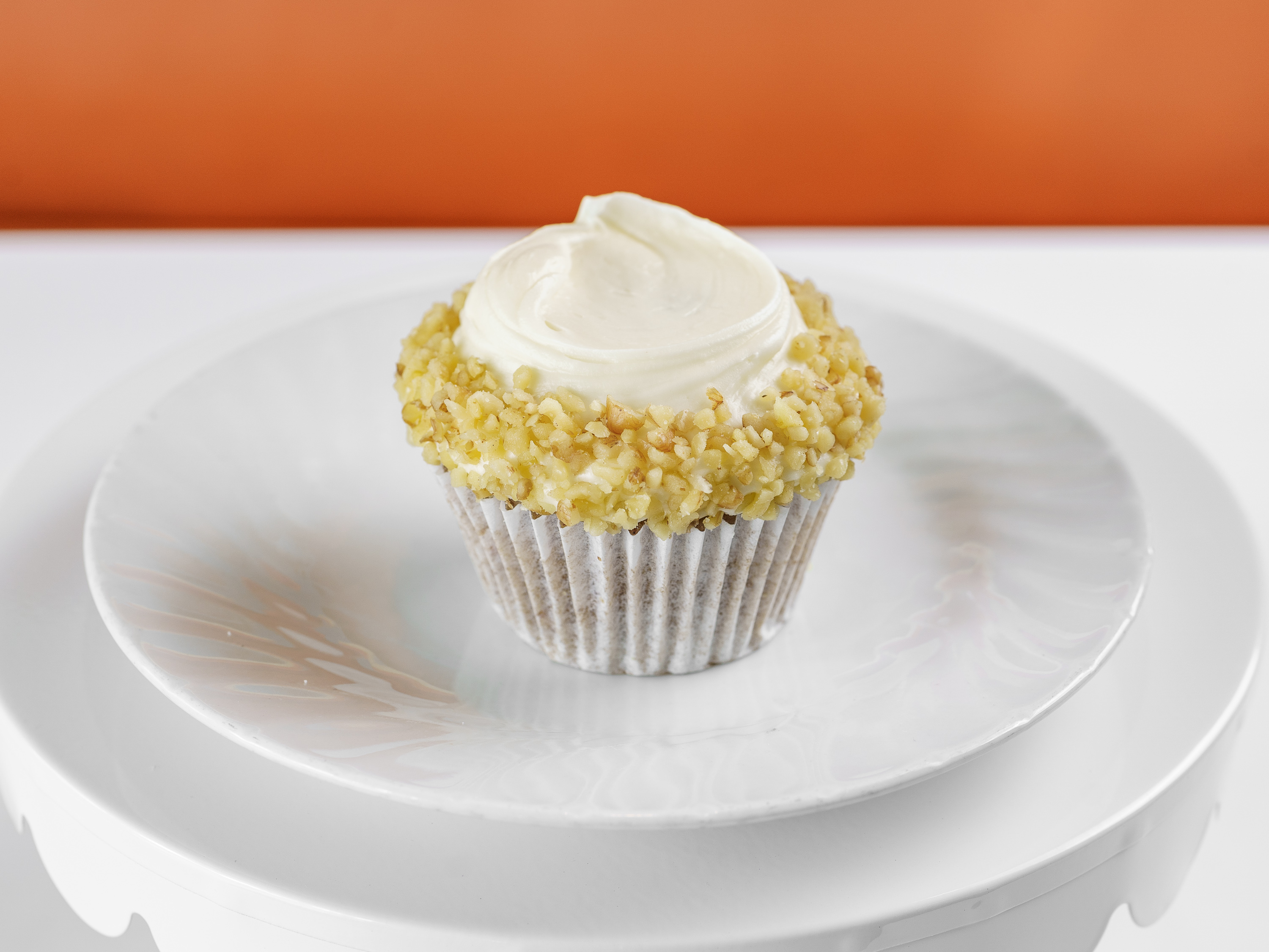 Order Carrot / Cream Cheese Cupcake food online from Frosted Cupcakery store, Long Beach on bringmethat.com