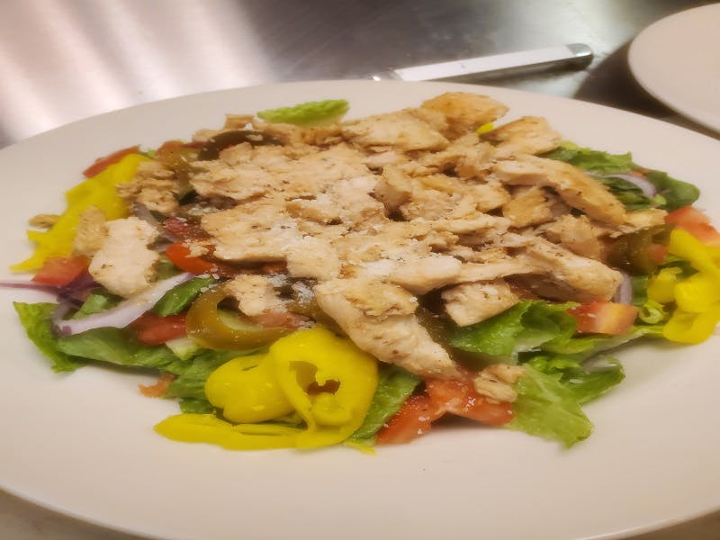 Order Grilled Chicken Salad - Salad food online from Pizza Leone store, Fairfield on bringmethat.com