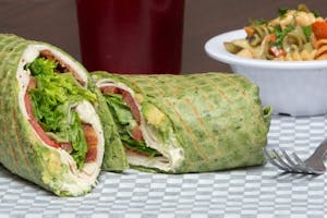 Order California Turkey Club Wrap food online from Aspen Deli store, Flagstaff on bringmethat.com