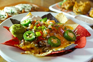 Order Unbelievably Loaded Nachos food online from Garry's Grill store, Severna Park on bringmethat.com