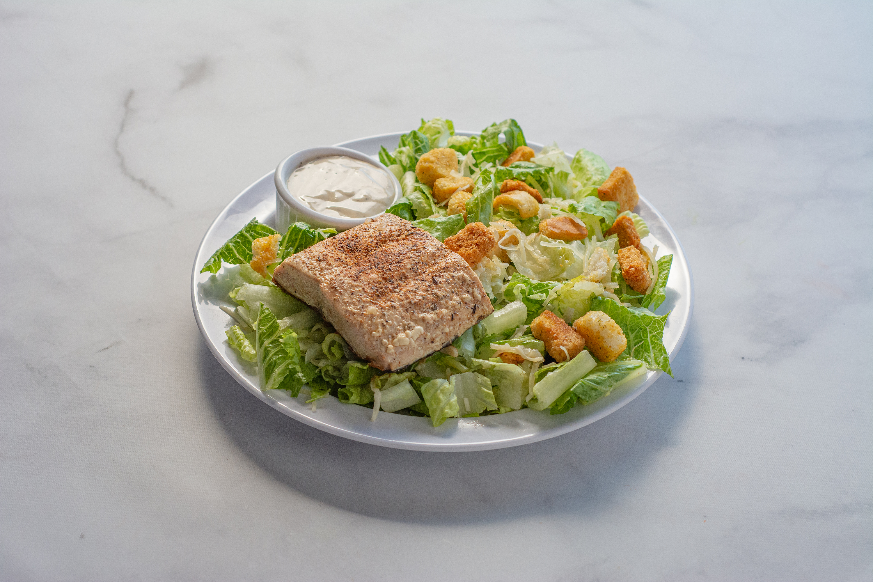 Order Grilled Salmon Caesar Salad food online from Manhattan Hub store, San Francisco on bringmethat.com