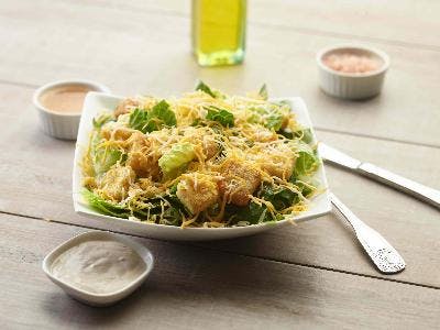 Order Caesar Salad - Salad food online from Pizza Twist store, Livingston on bringmethat.com