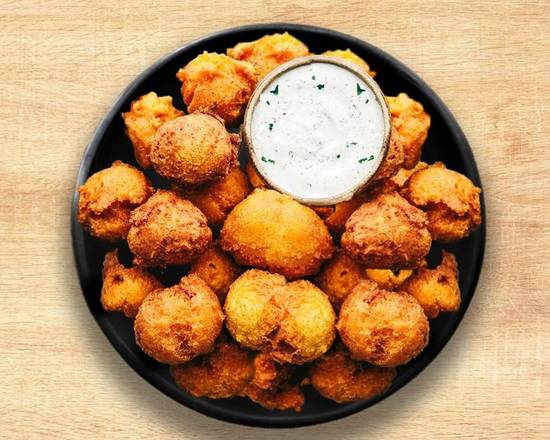 Order Large Hush Puppies food online from Fat Fish store, Mobile on bringmethat.com