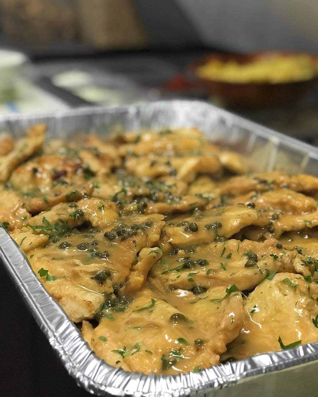 Order Chicken Piccata Catering - Half Pan (Serves 5-8 People) food online from Planet Pizza store, Ridgefield on bringmethat.com