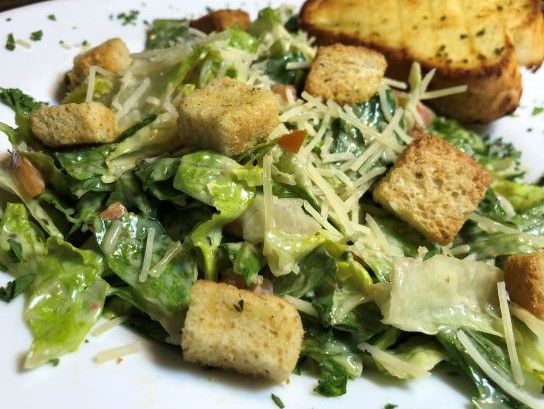Order Caesar Salad food online from Broadway Bar and Pizza store, Minneapolis on bringmethat.com