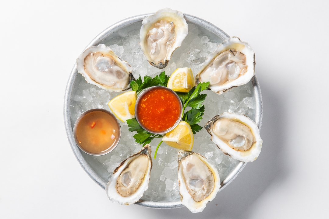 Order East Coast Oyster food online from Crave Fishbar store, New York on bringmethat.com