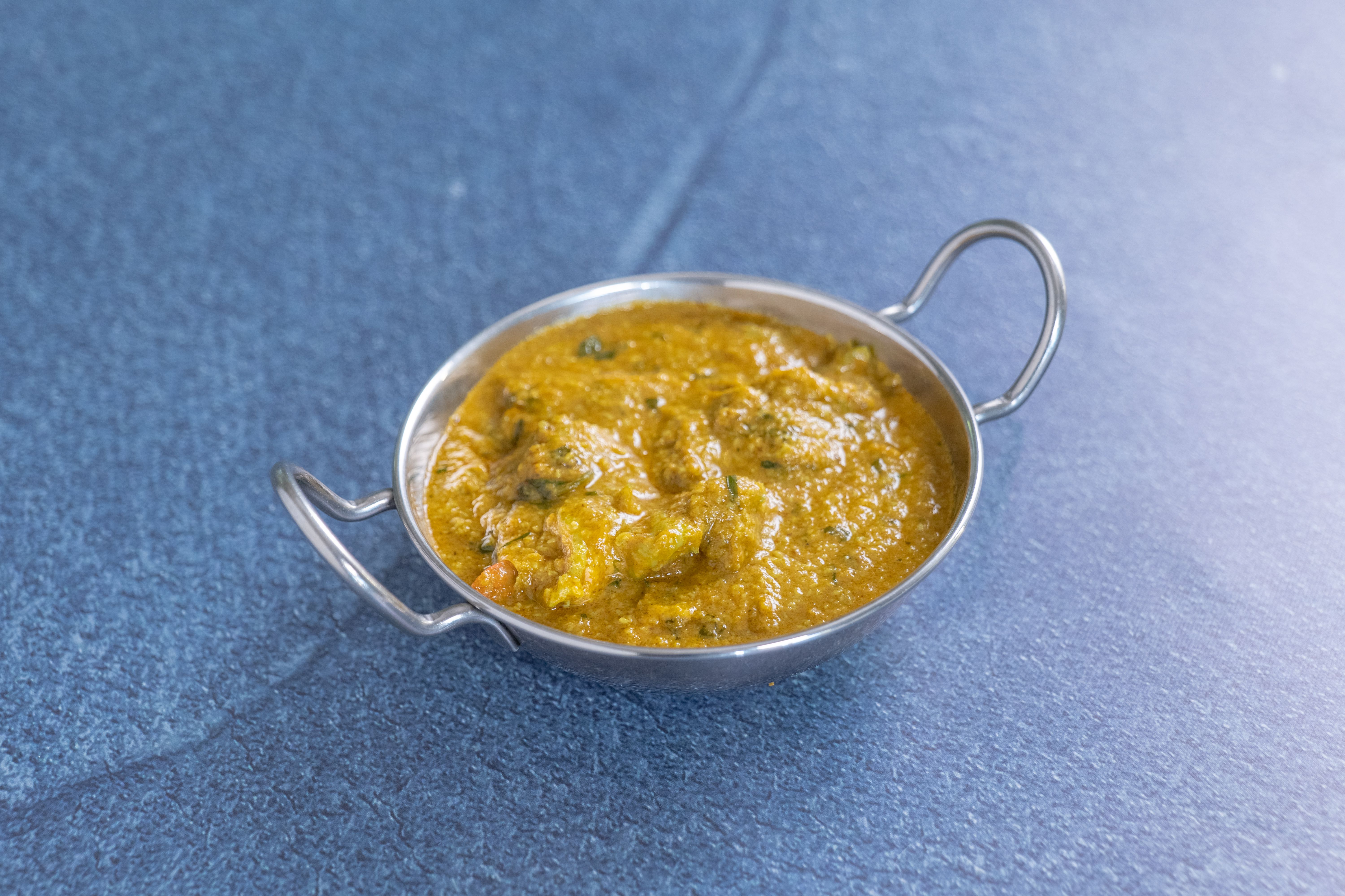 Order Chicken Coconut Curry food online from All Indian Sweets And Snacks store, Torrance on bringmethat.com