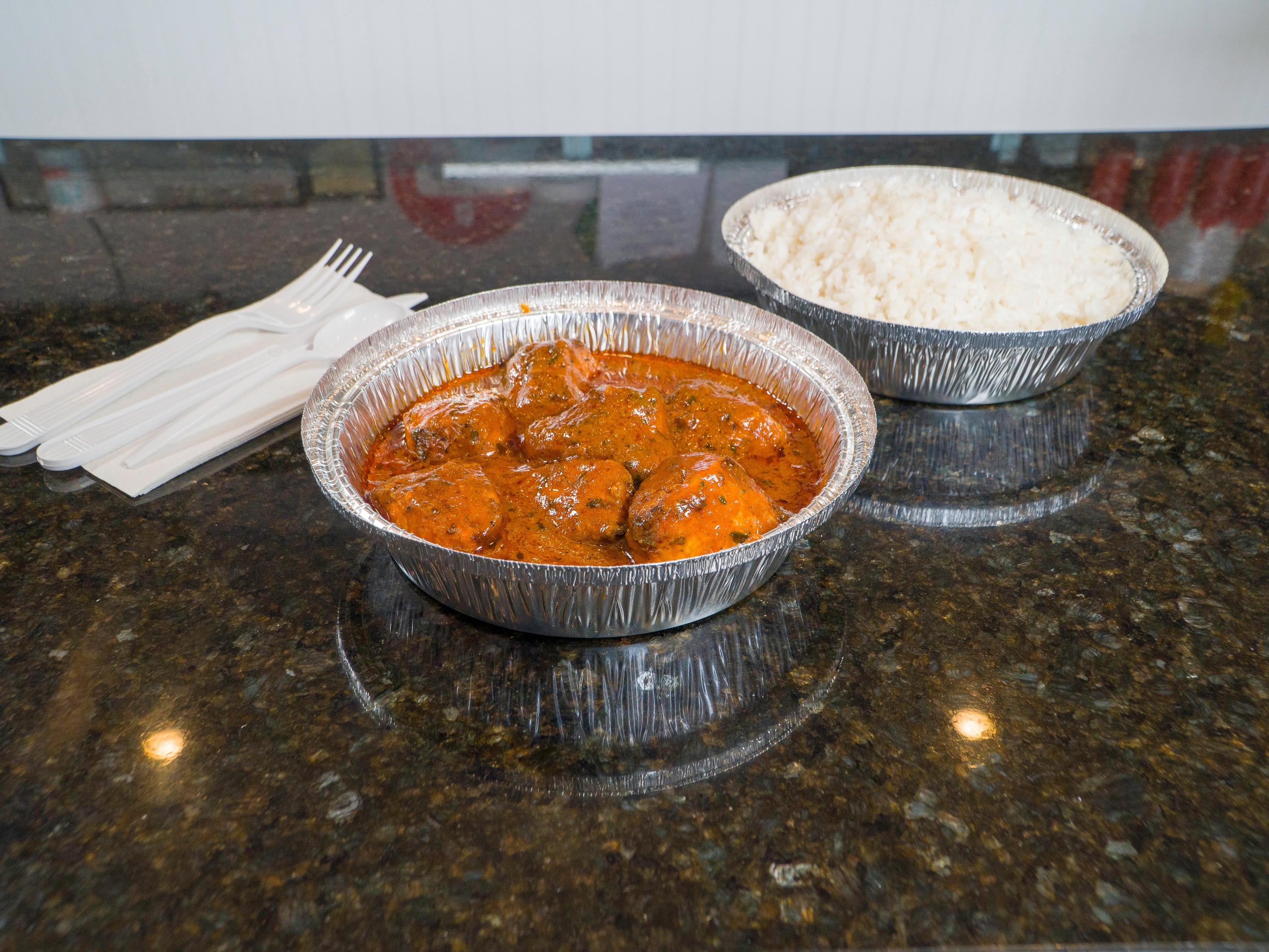 Order Butter Chicken food online from Papa Curry store, Arlington on bringmethat.com