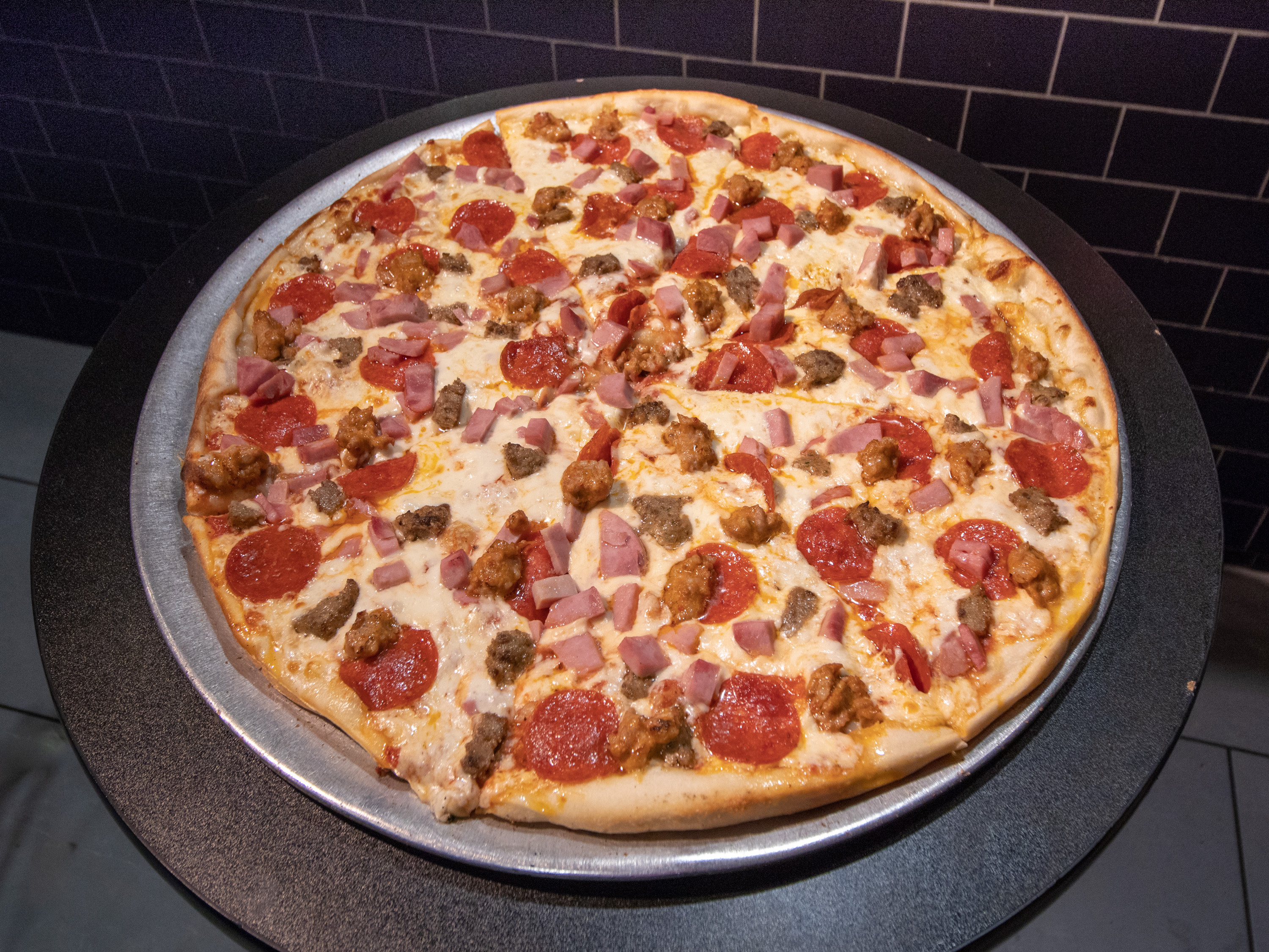 Order Meat Lovers Pizza Pie food online from 2 Bros Pizza store, New York on bringmethat.com