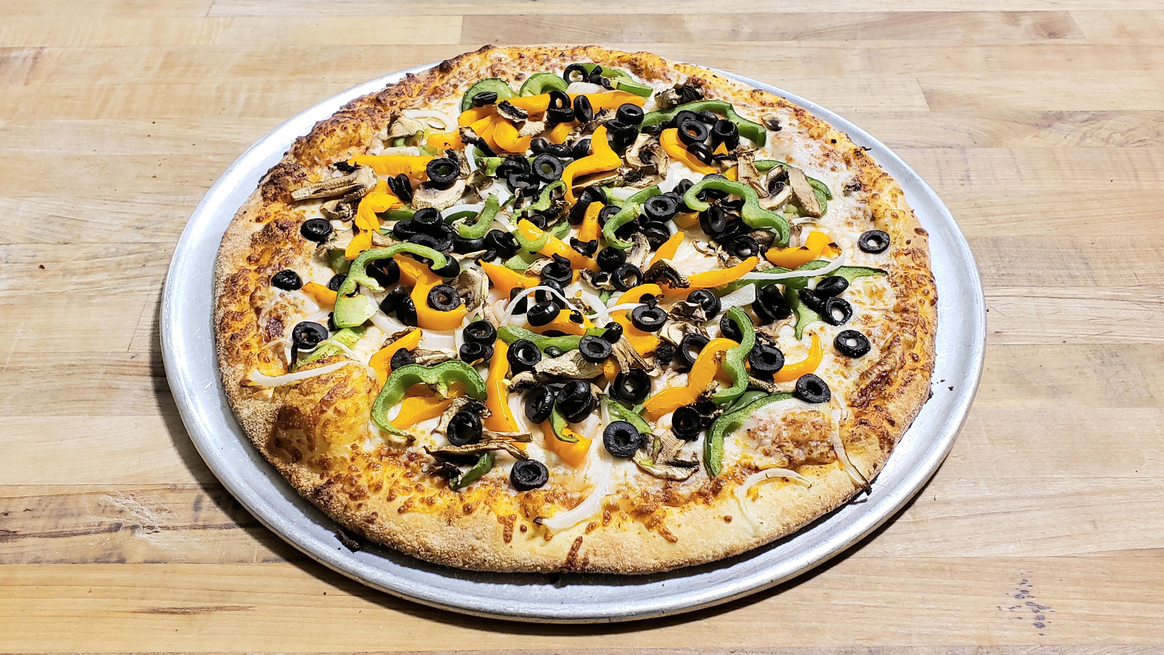 Order Veggie food online from La Quinta Pizza store, Redwood City on bringmethat.com