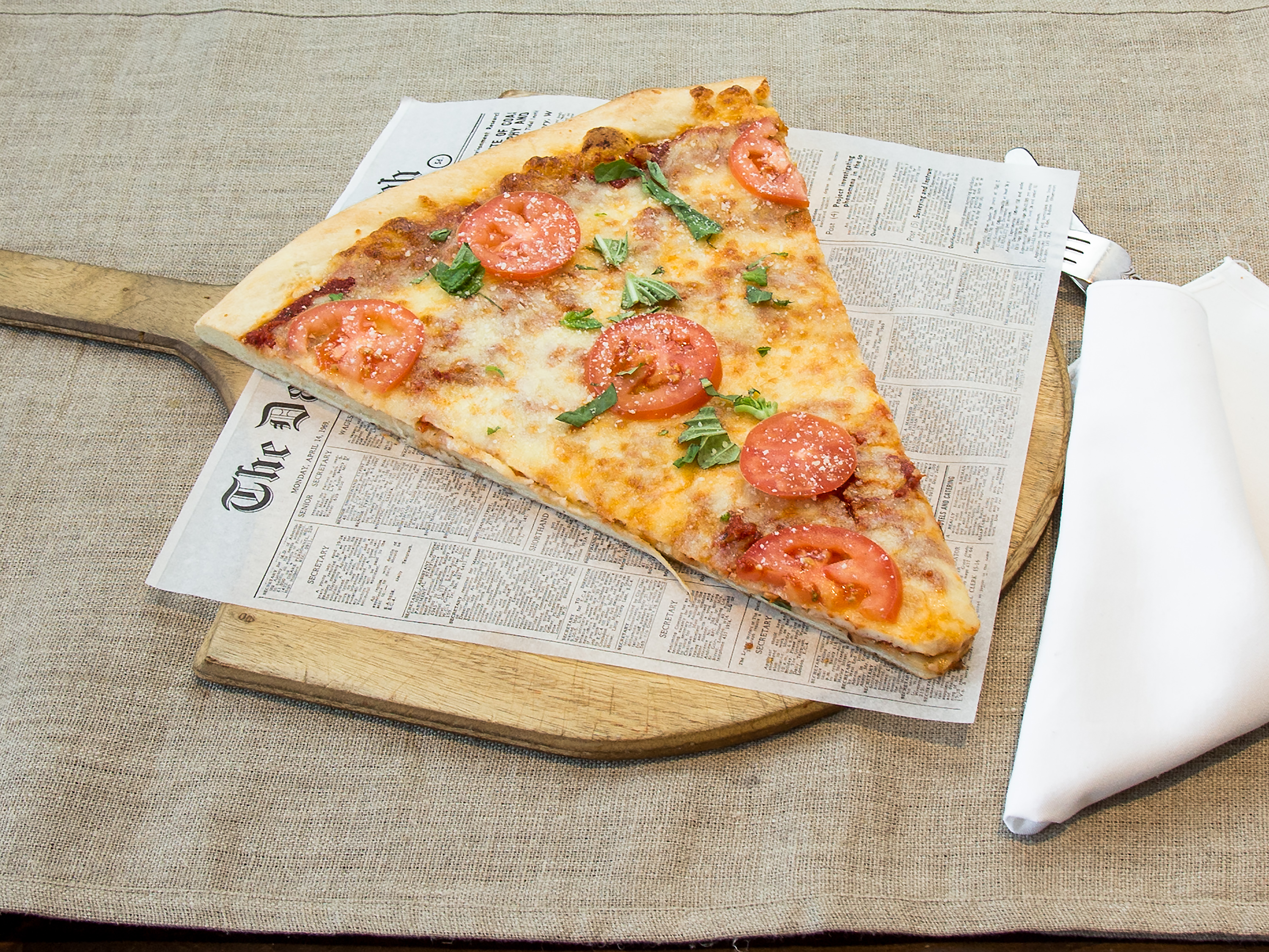 Order Jumbo Margherita Slice Pizza food online from Bacci Pizzeria store, Chicago on bringmethat.com