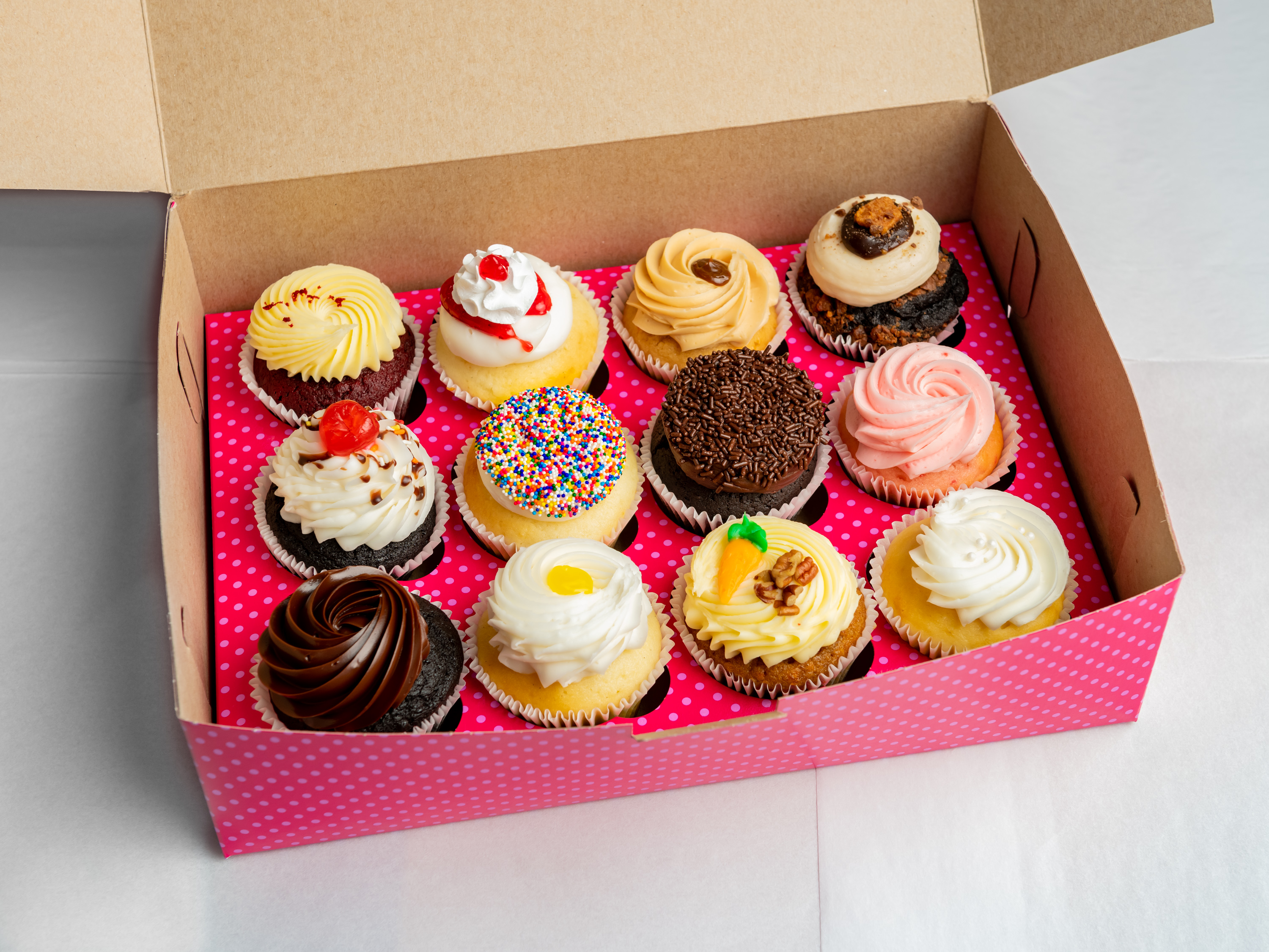 Order 12 Cupcakes Box food online from Smallcakes store, Missouri City on bringmethat.com