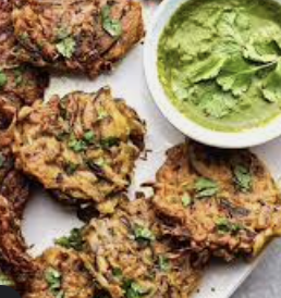 Order Onion and Spinach Bhajis food online from Madam Ji store, New York on bringmethat.com