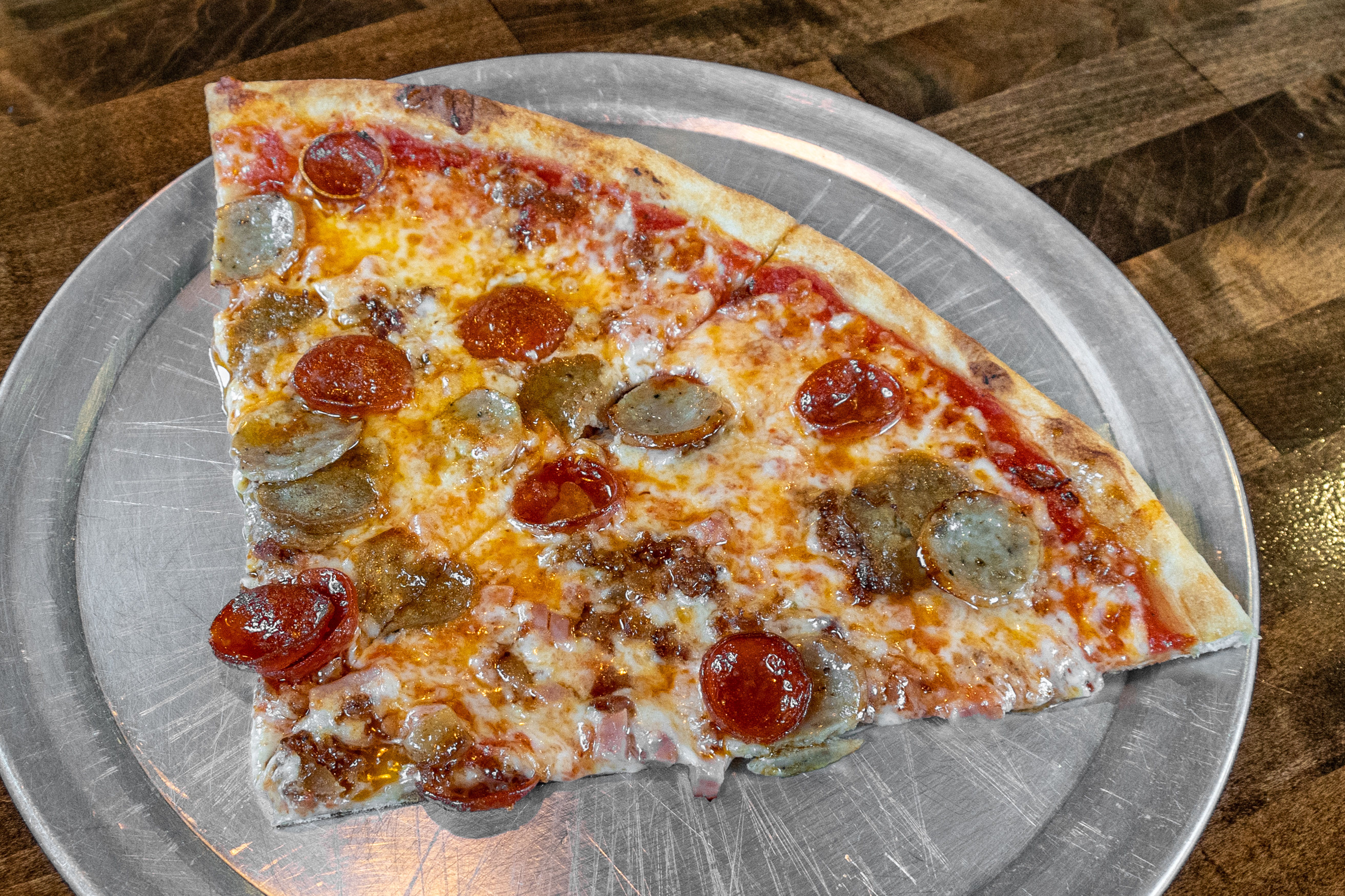 Order Meaty Pizza - Medium food online from That's Italian Pizza & Pasta - Hinesville store, Hinesville on bringmethat.com