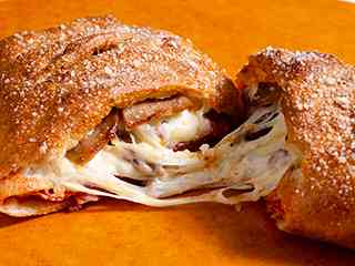 Order steak calzone food online from Sarpino's Pizzeria store, Chicago on bringmethat.com