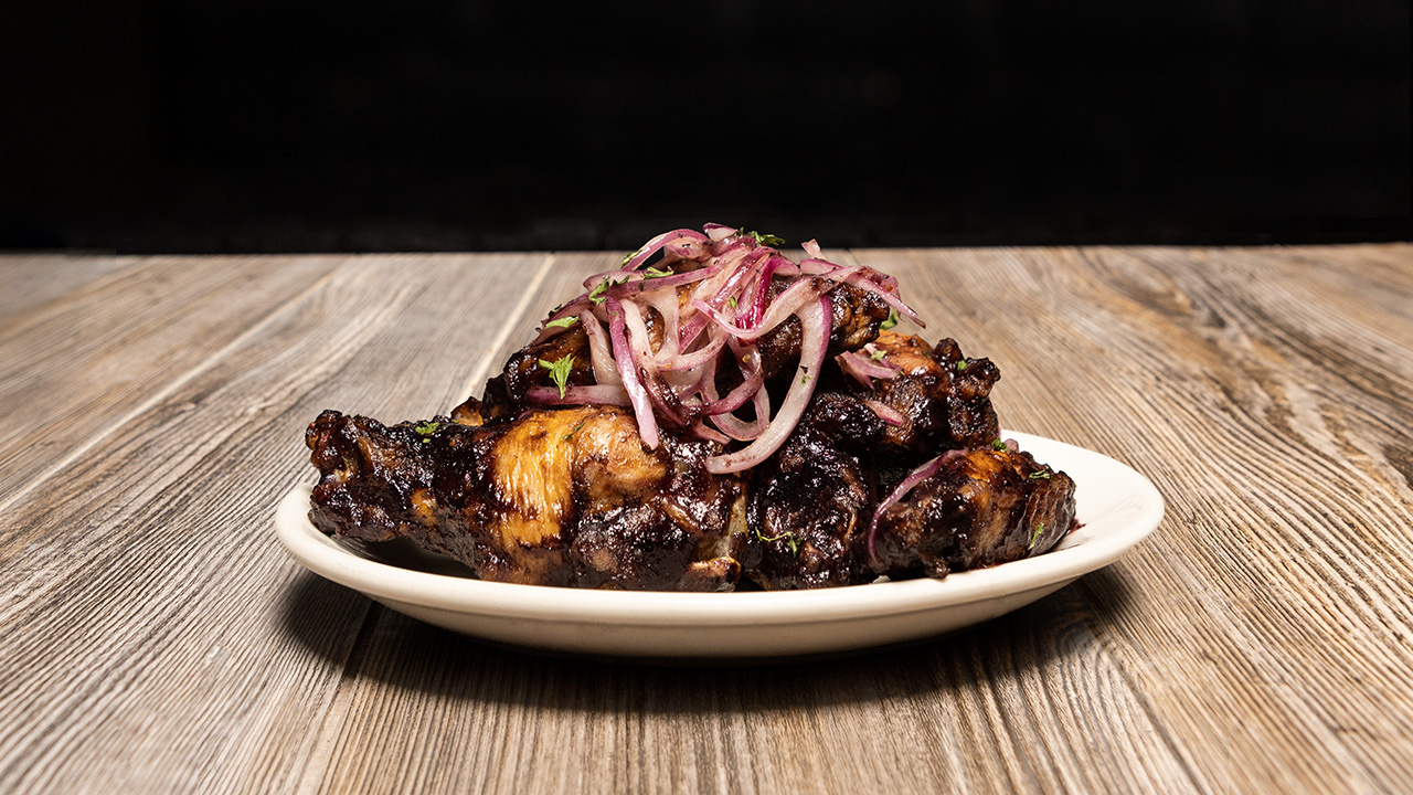 Order Blueberry BBQ Wings 11ct food online from DMK Burger Bar store, Chicago on bringmethat.com