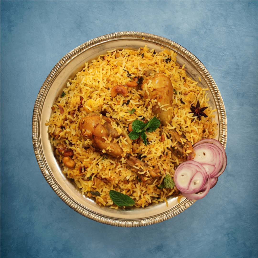 Order Chicken Biryani Peshawari food online from Gunpowder Cafe store, Suwanee on bringmethat.com
