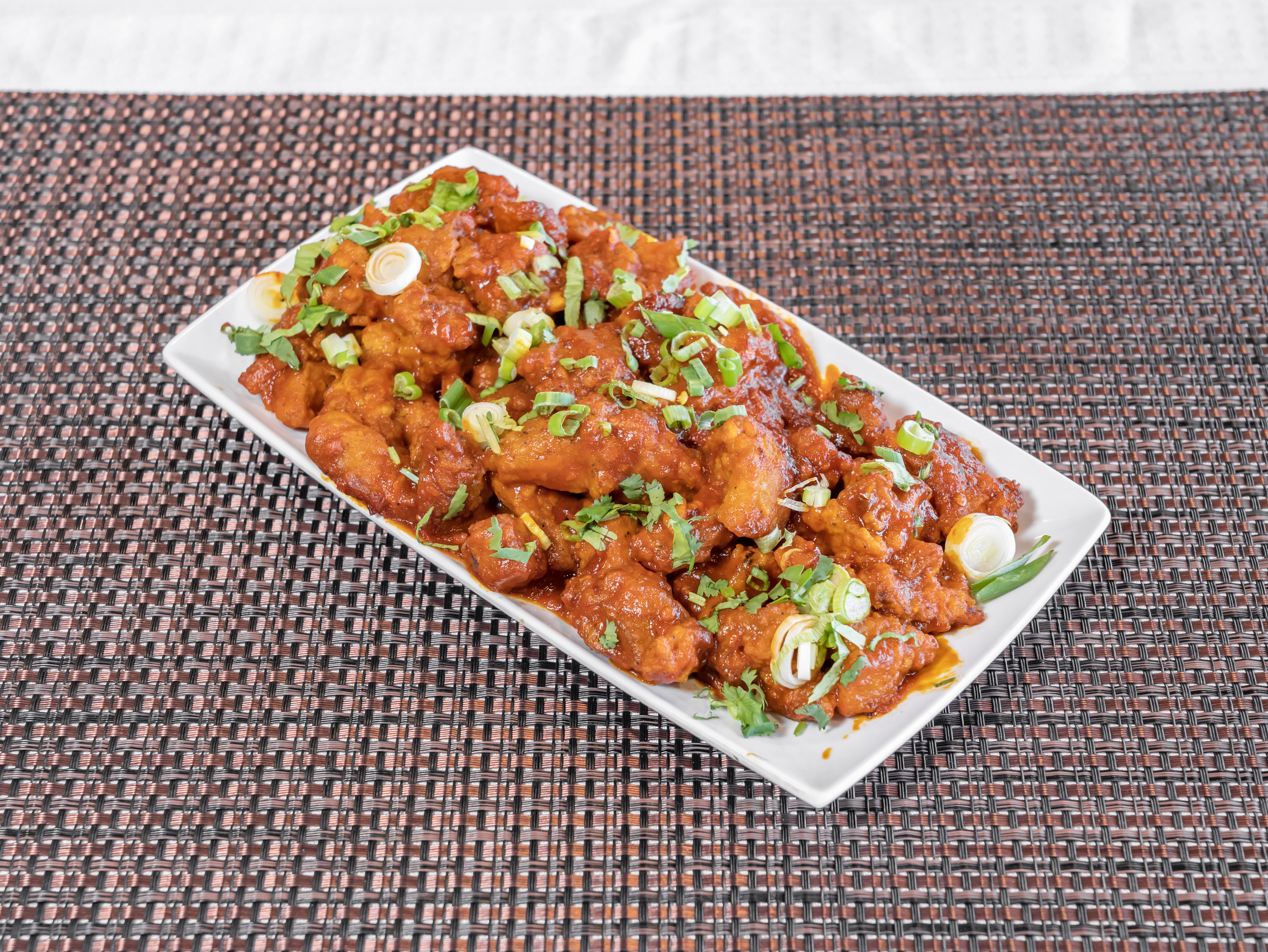 Order 13. Chicken Manchurian food online from Charminar Biryani House store, Troy on bringmethat.com