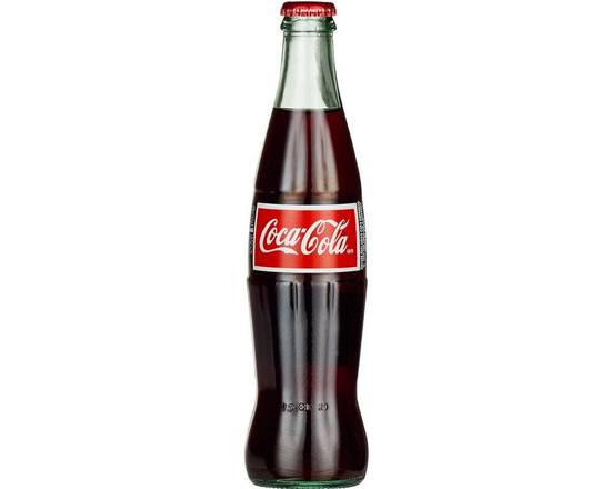 Order MEXICO COKE   food online from Dr Wok Asian Bistro store, Austin on bringmethat.com