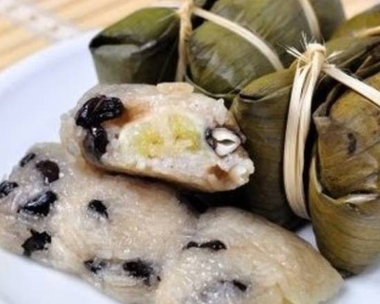 Order Sticky rice with banana fillings. food online from Thai Thank You store, Chicago on bringmethat.com