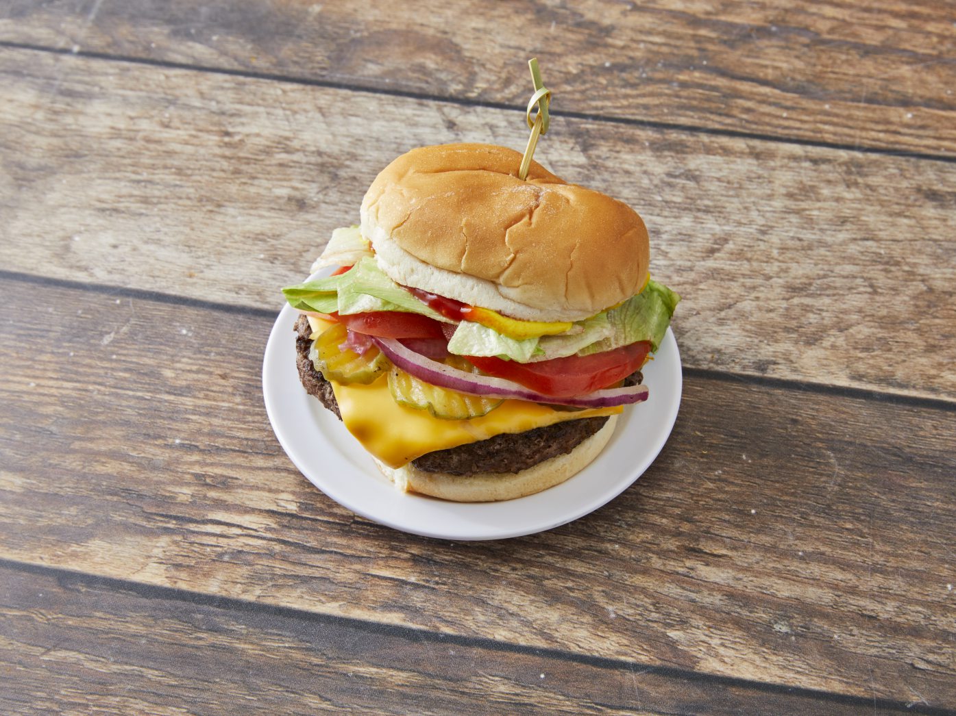 Order 1/2 lb. Cheeseburger food online from Papa Pizza store, Farmington Hills on bringmethat.com