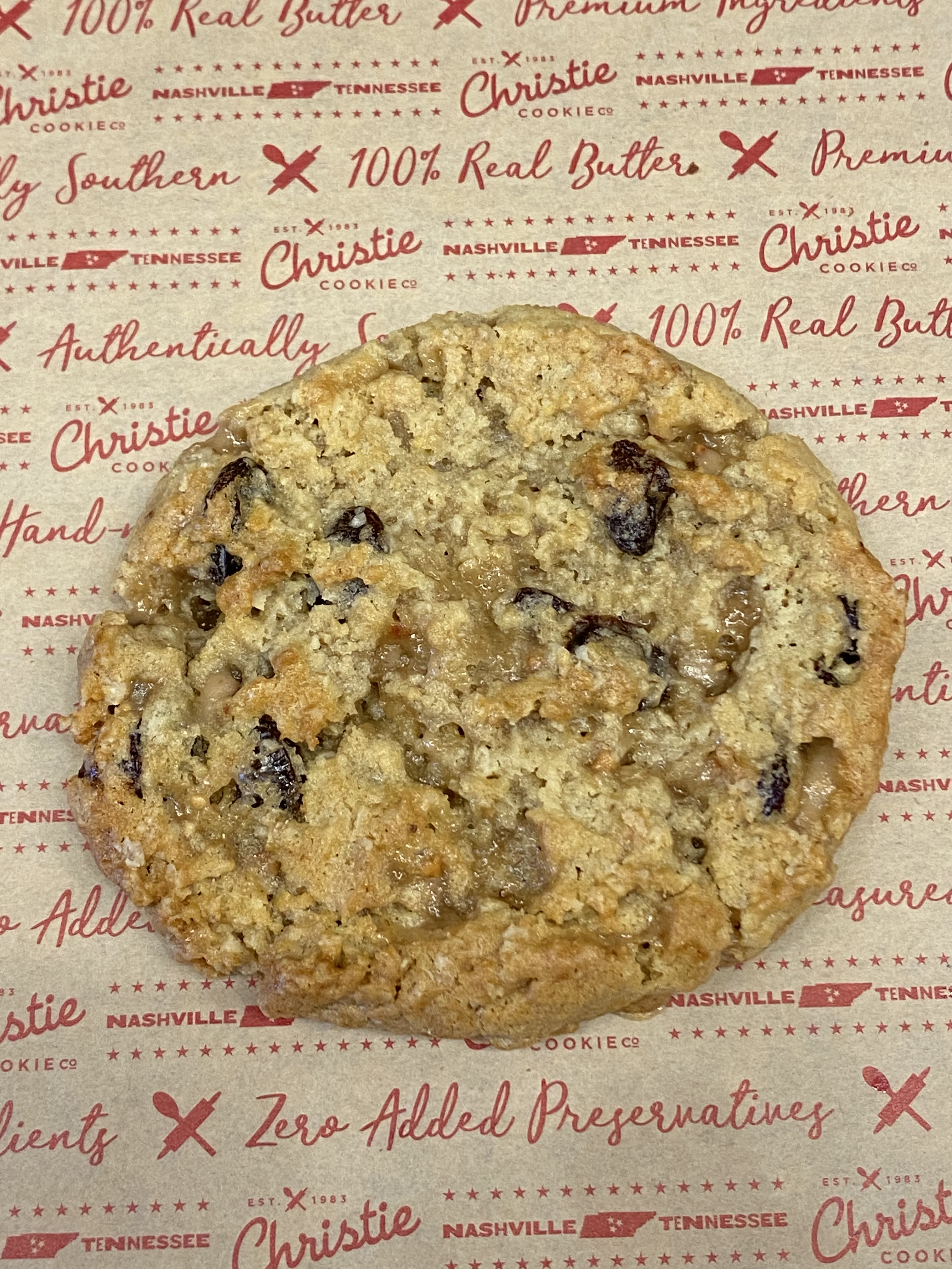 Order 1 Oatmeal Raisin Cookie food online from Christie Cookie Co store, Nashville on bringmethat.com