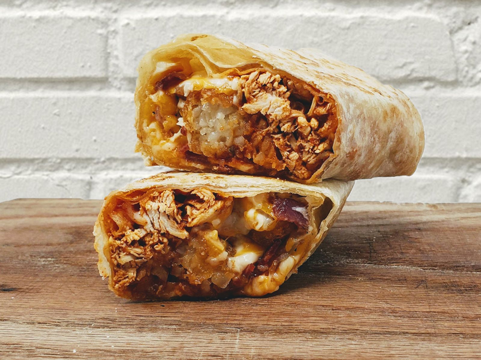 Order Buffalo Soldier Burrito - Chicken + Bacon food online from Pipeline Wraps store, Burbank on bringmethat.com