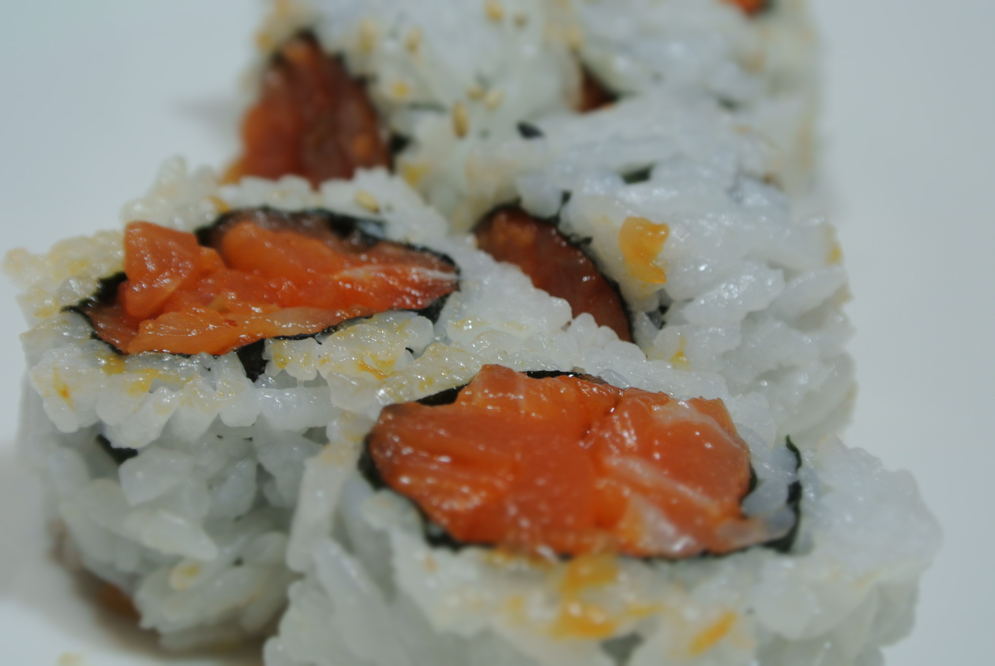 Order Spicy Salmon Roll food online from Tokyo Roll And Noodle store, Chino Hills on bringmethat.com