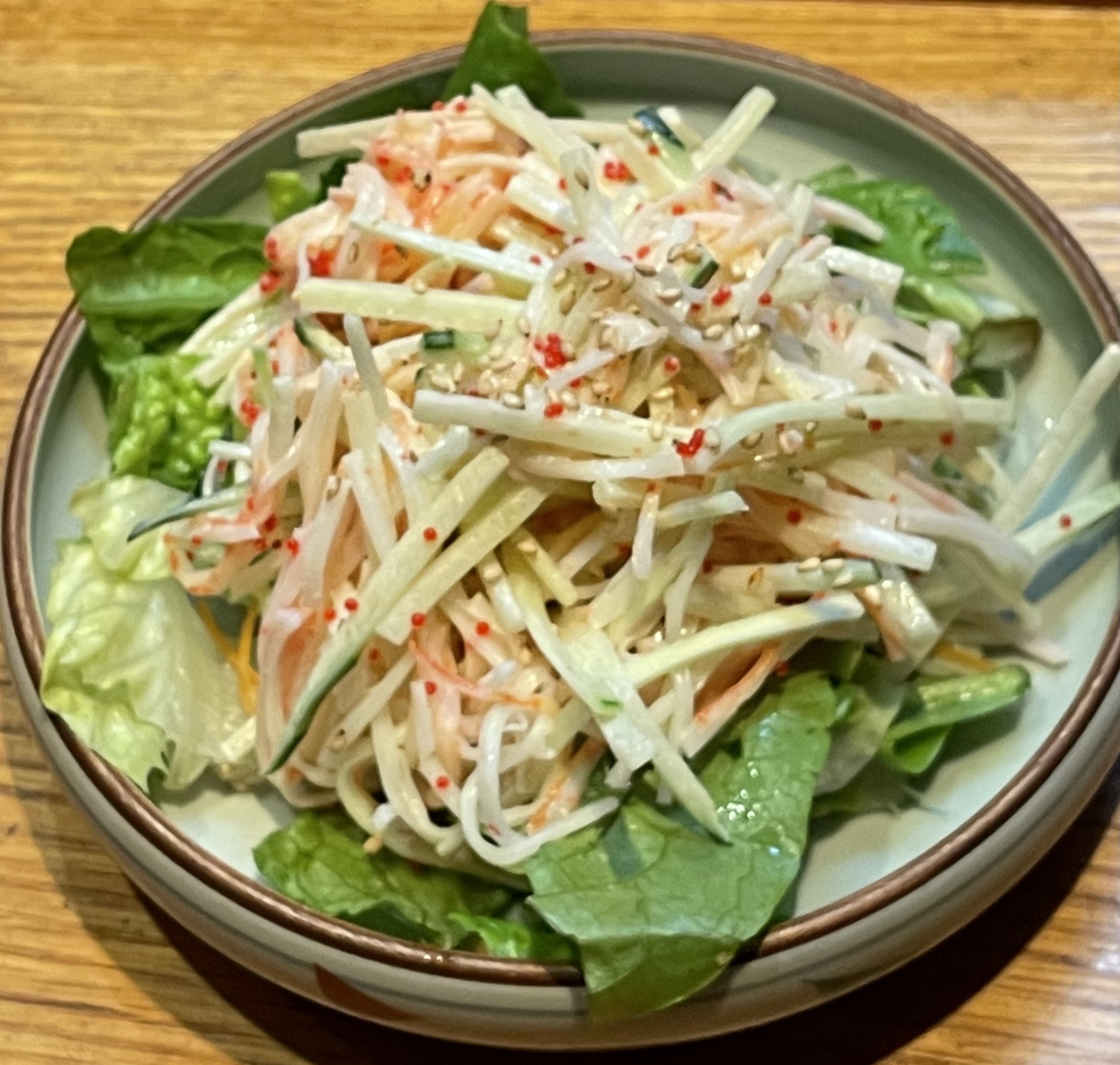 Order 11. Kani Salad food online from Mikaku store, New York on bringmethat.com