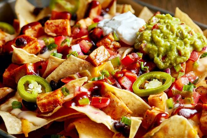 Order BBQ Chicken Street Nachos food online from Ruby Tuesday store, Clinton on bringmethat.com