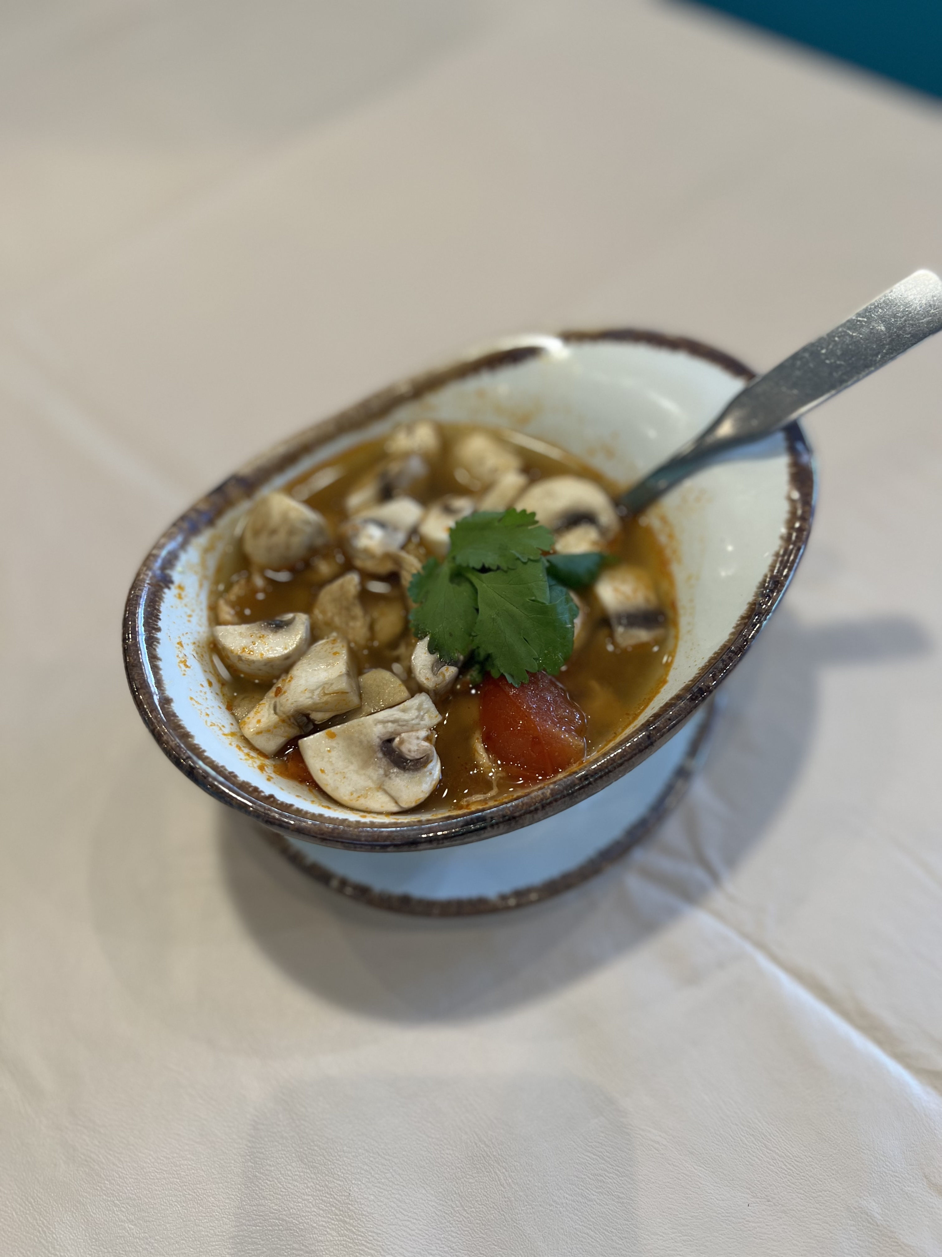Order Tom Yum Chicken Soup food online from Ploy Thai Cuisine store, The Woodlands on bringmethat.com