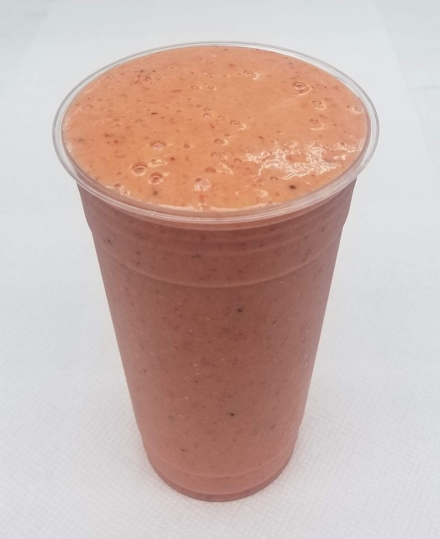 Order Mango, Pineapple and Strawberry blended with ice food online from Juice Bar Plus store, New York on bringmethat.com
