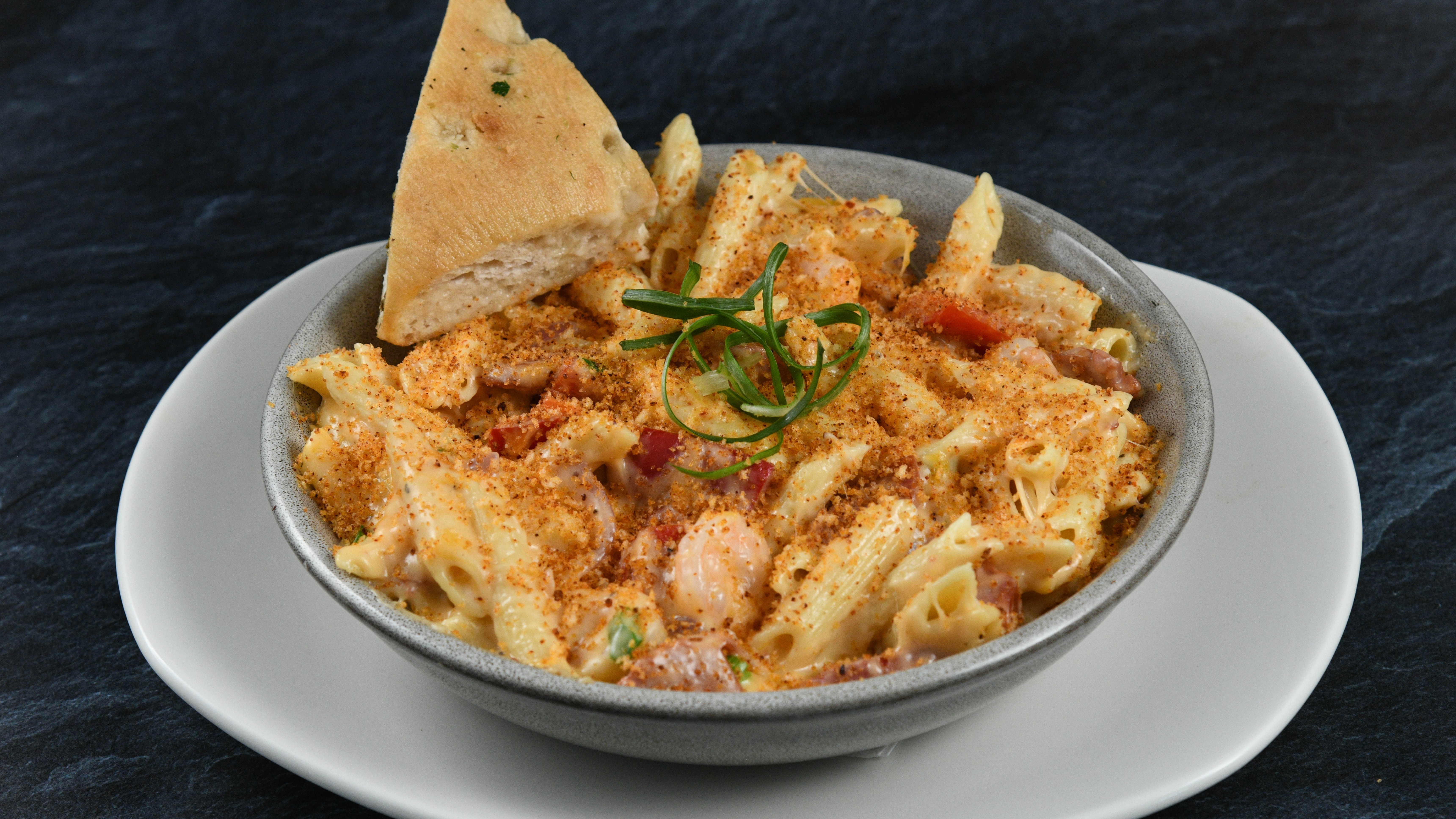 Order Creole Mac N Cheese food online from Rainforest Cafe store, Atlantic City on bringmethat.com