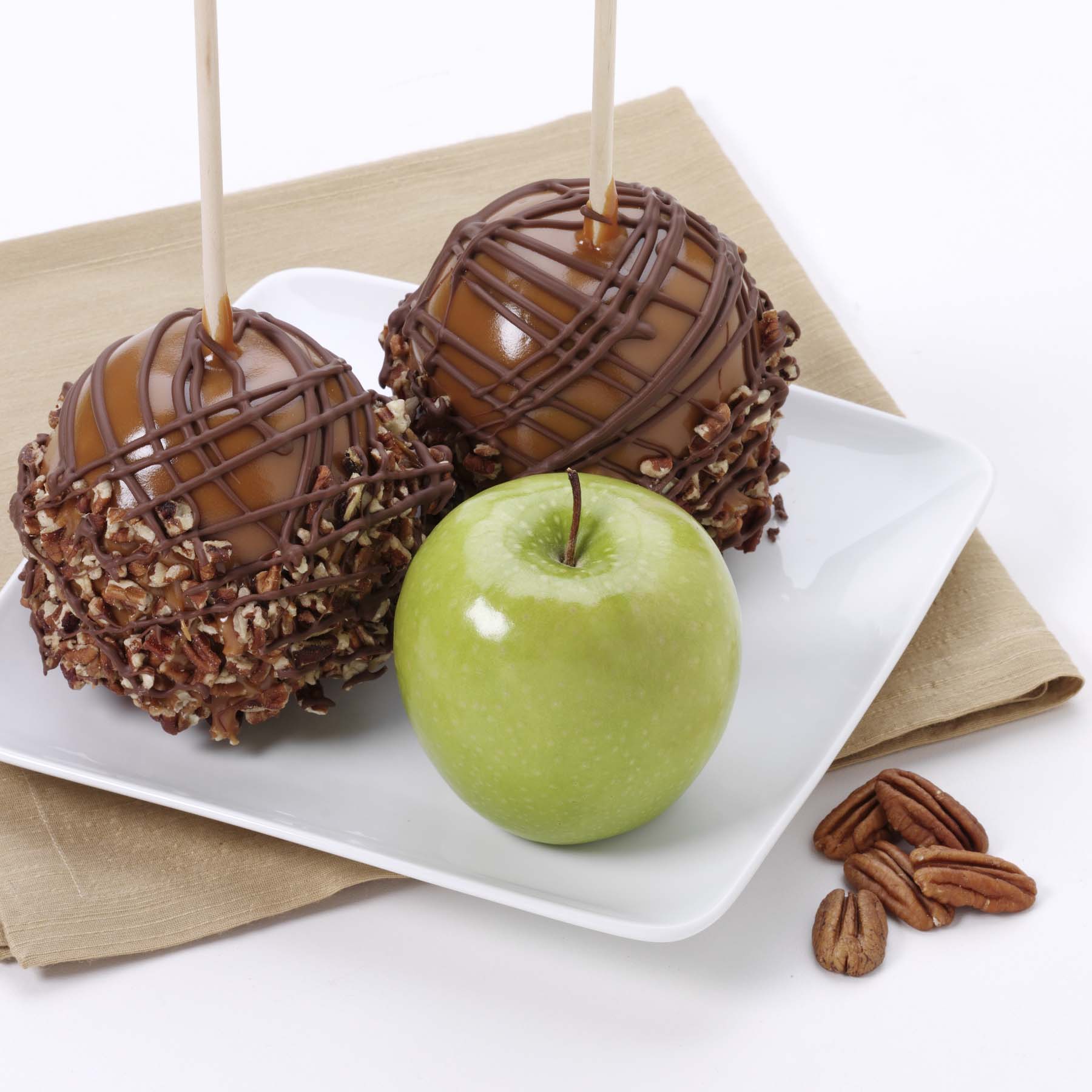 Order Caramel Apple with Chocolate and Pecans food online from Russell Stover Chocolates store, Omaha on bringmethat.com