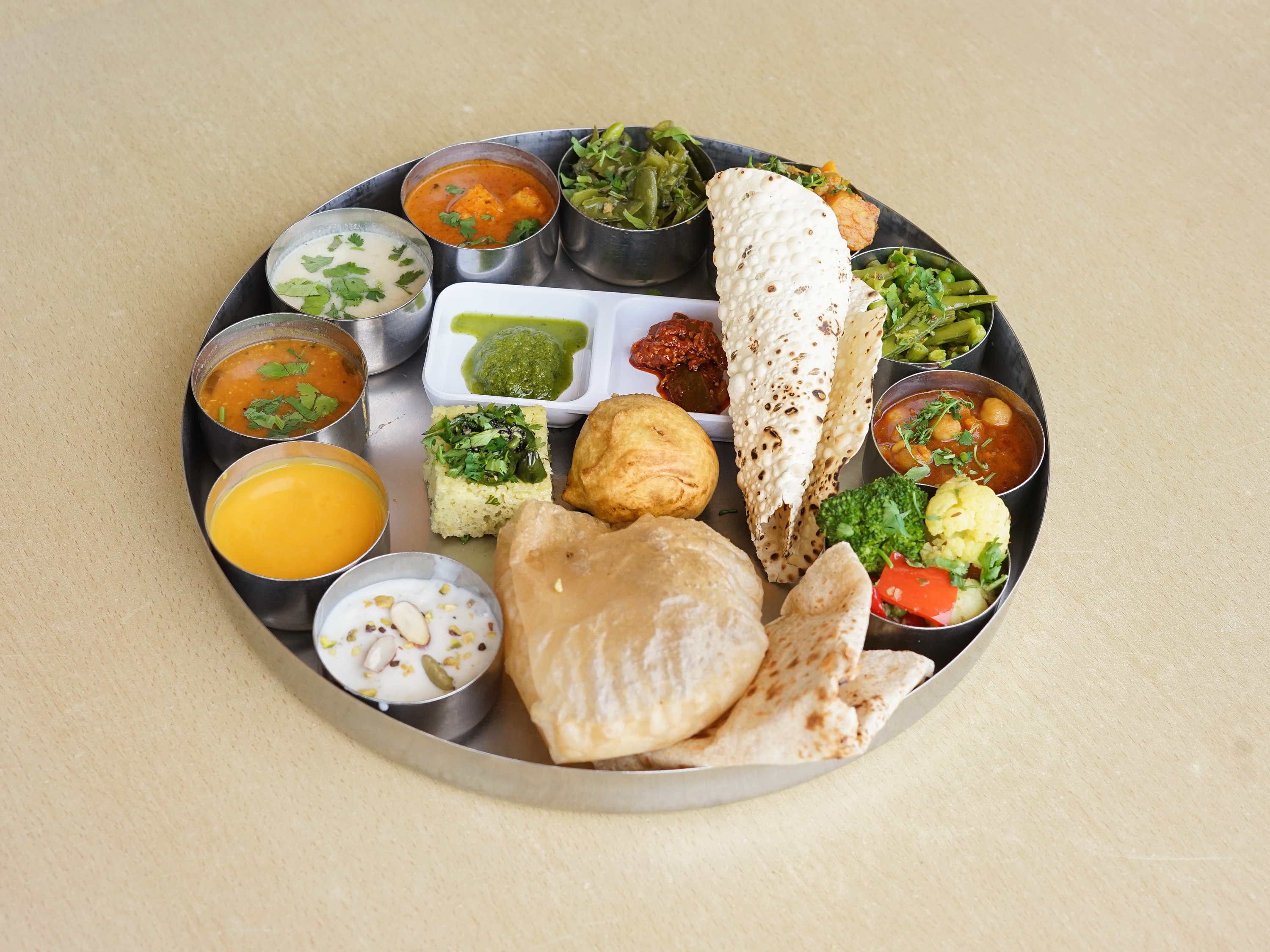Order Large Family Togo food online from Rajwadi Thali Chaat & Sweets store, Fremont on bringmethat.com