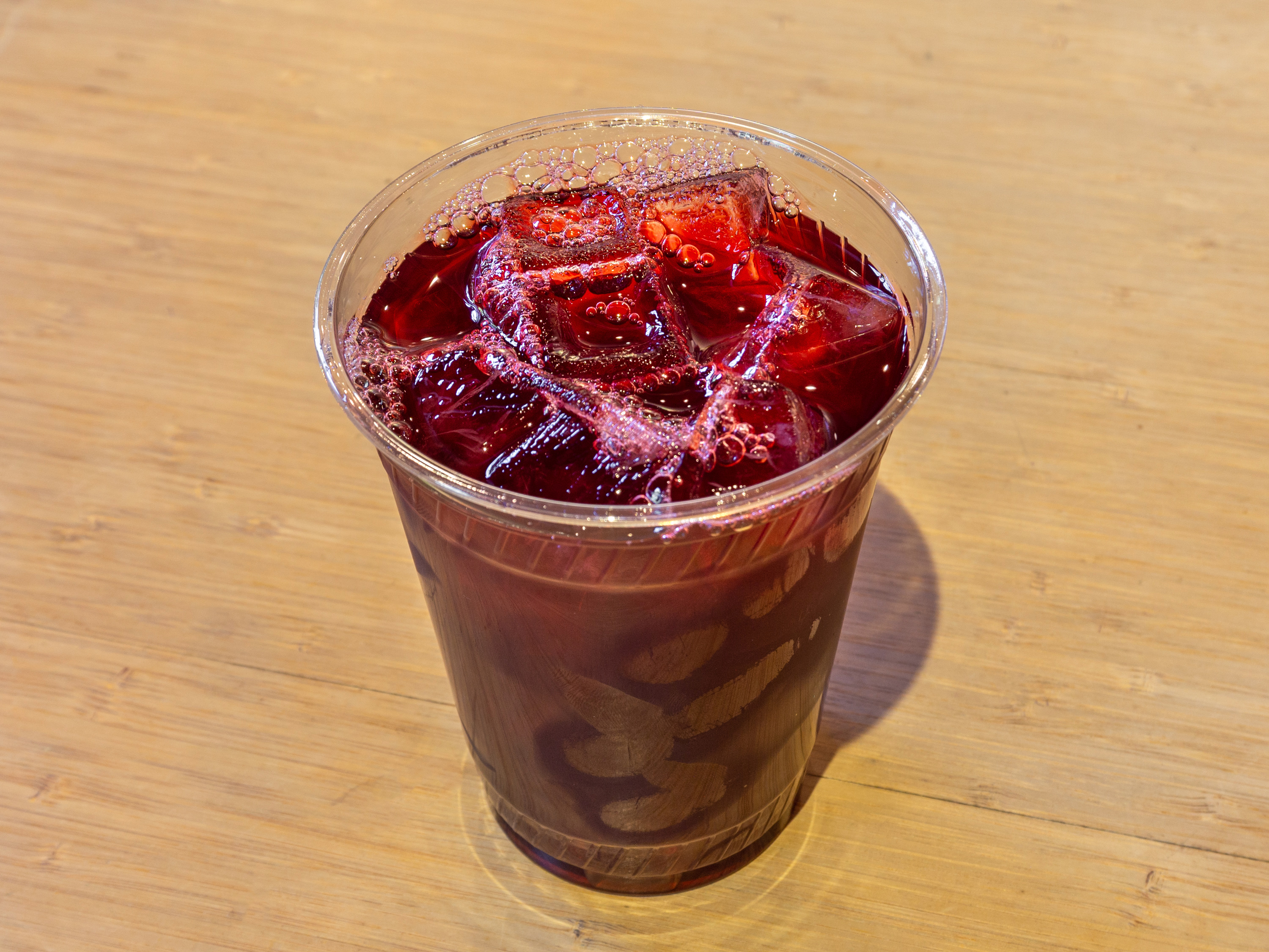 Order Iced Hibiscus Tea 16 oz. food online from 8a5e store, Chicago on bringmethat.com