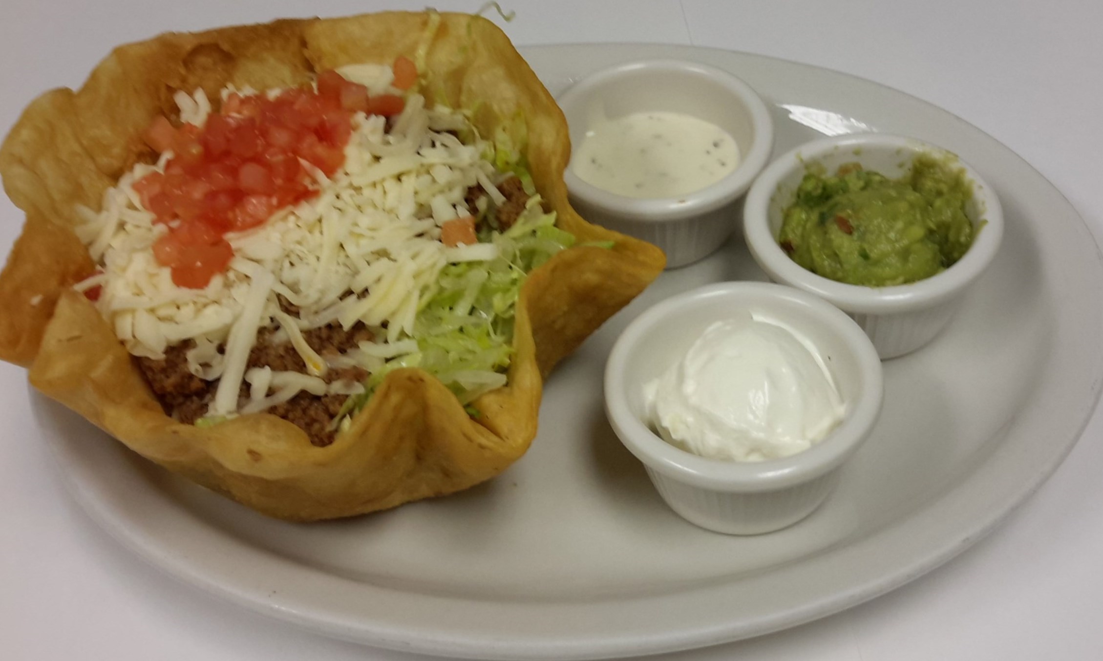 Order Ground Beef Taco Salad food online from Quinta Carmina store, Belvidere on bringmethat.com