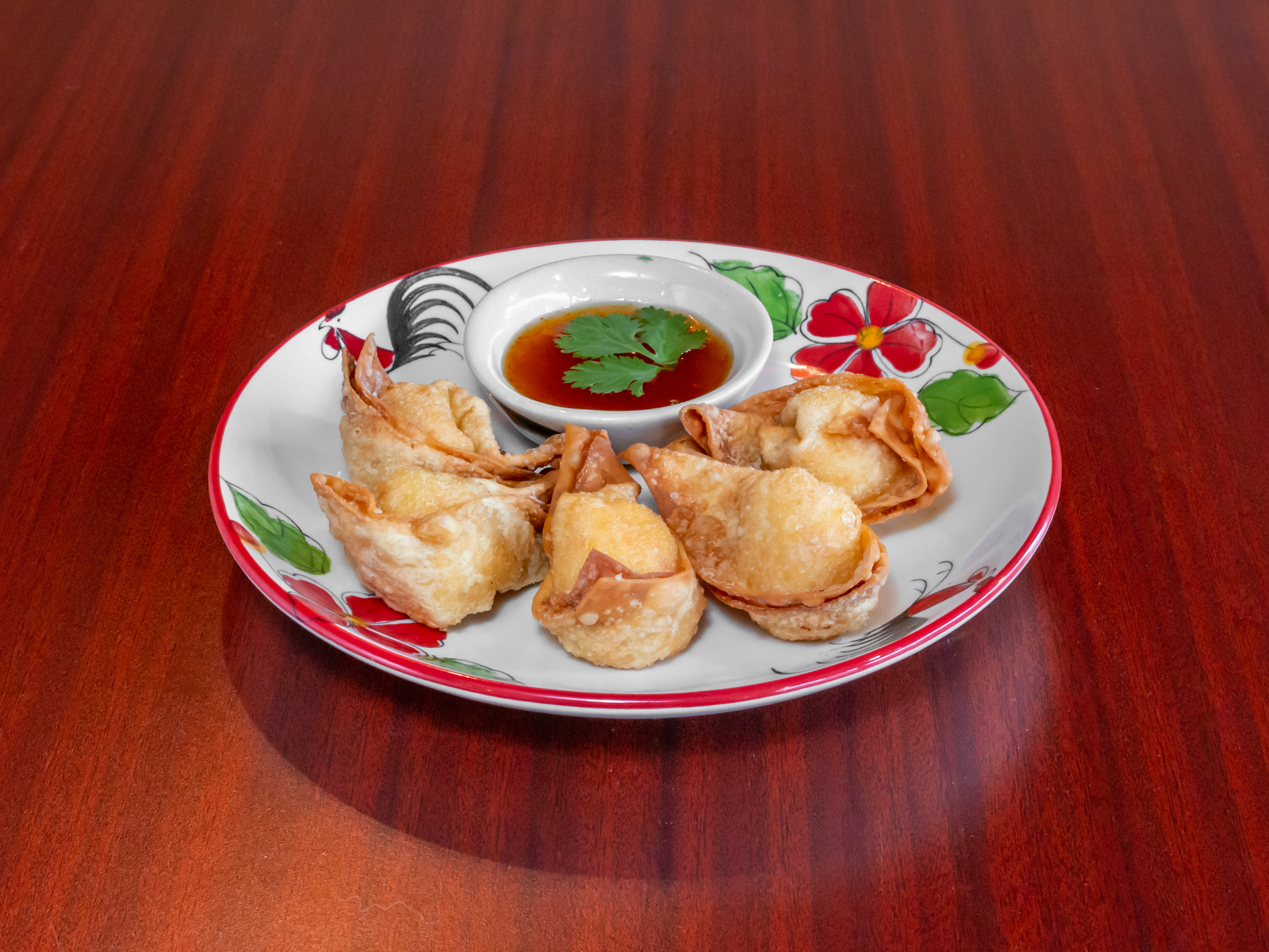 Order Crab Rangoon food online from Real Thai Restaurant store, Chicago on bringmethat.com