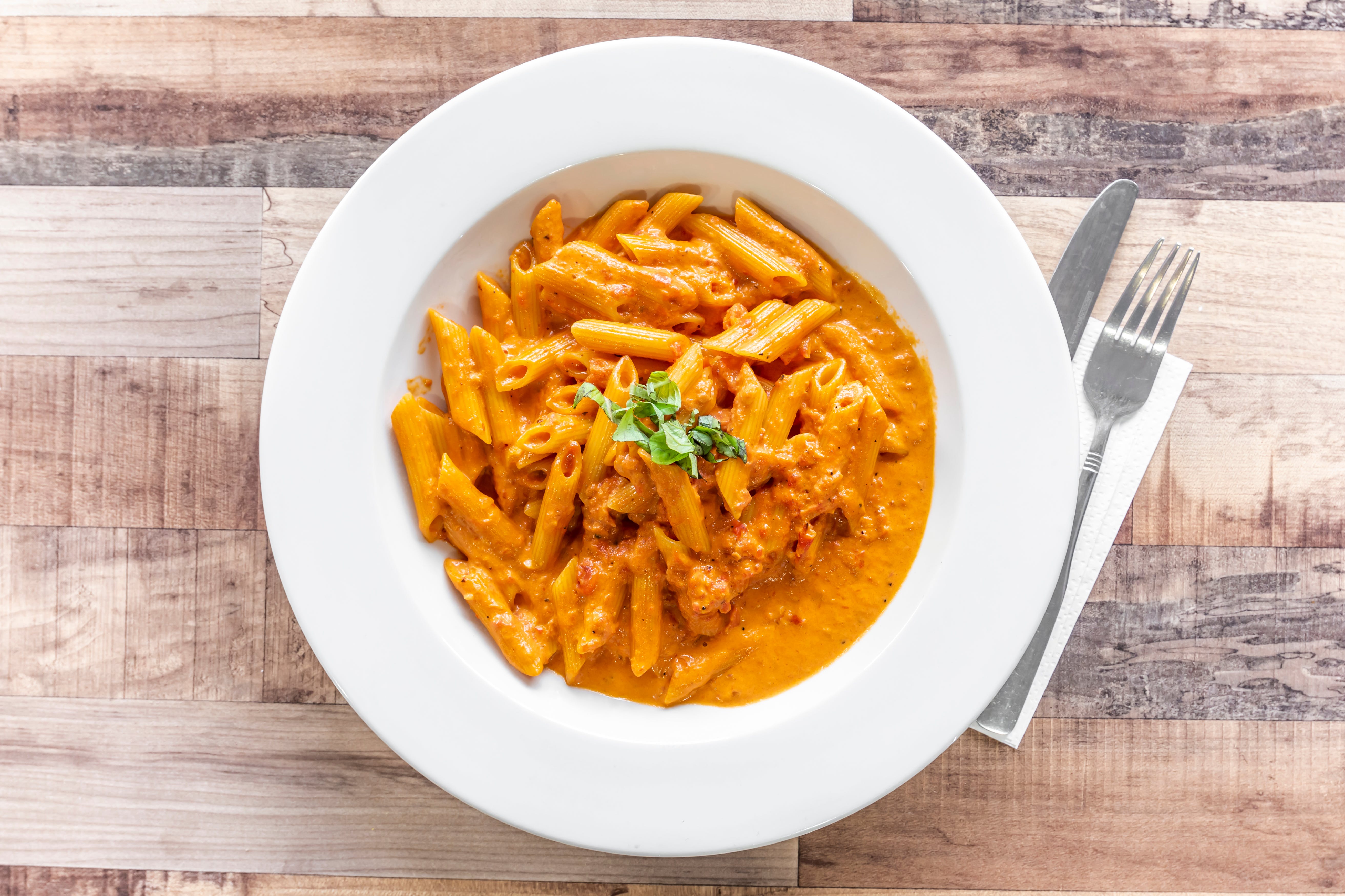 Order Penne Vodka - Pasta food online from Pasquales Pizzeria store, Wall Township on bringmethat.com