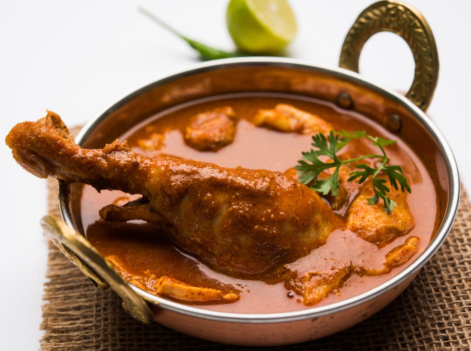 Order TRADITIONAL CHICKEN CURRY food online from India Oven store, El Dorado Hills on bringmethat.com