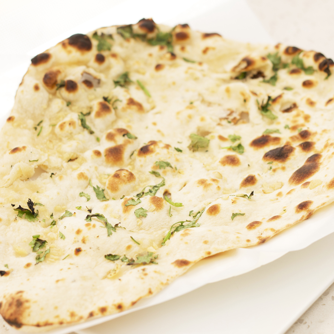 Order Garlic Naan food online from The Bombay Frankie Company store, Culver City on bringmethat.com